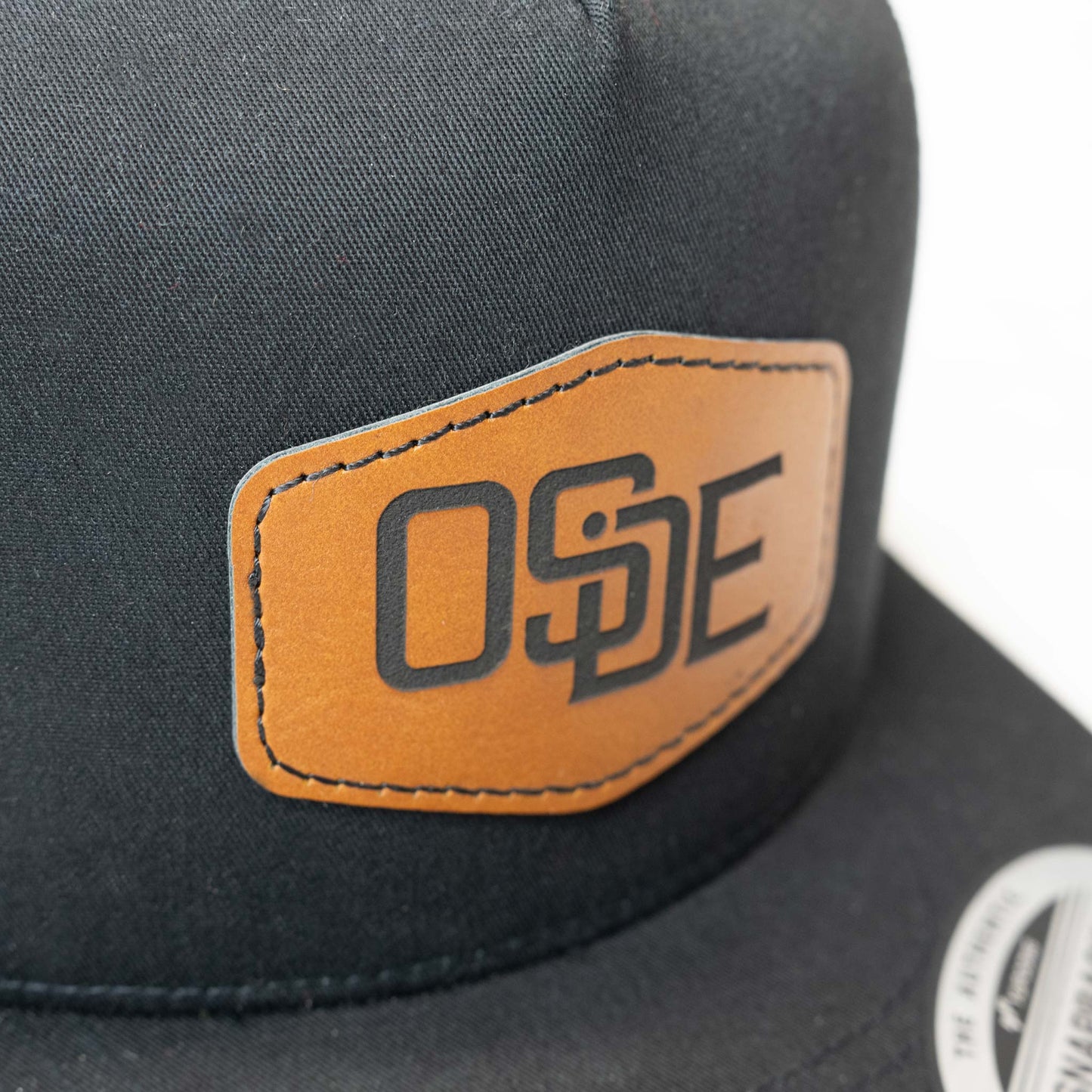 Oside OG Black Trucker Hat - Leatherette Hexagon Patch